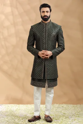 Green Double layered Sherwani Embellished with antique Gold thread work embroidery.